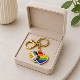 Exklusiver Doppelherz Schlüsselanhänger – Progress-Pride Edition – Offizielles love-union.de Logo-Design in Gold - Love-Union.de